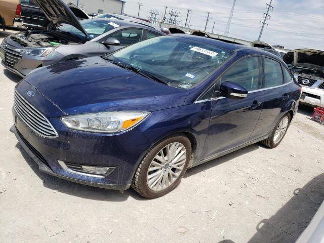 FORD FOCUS TITA 2016 with VIN 1FADP3J21GL358916 - Photo from auction