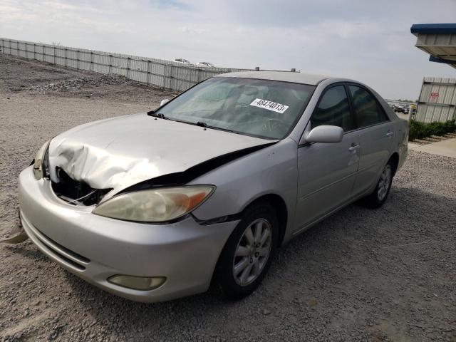 TOYOTA CAMRY LE 2003 with VIN 4T1BE32KX3U241874 - Photo from auction