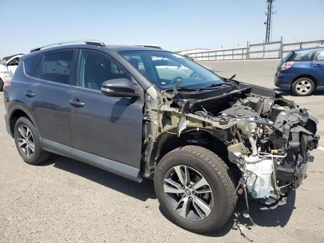 Photo 4 from auction – 2016 TOYOTA RAV4 XLE with VIN 2T3RFREV7GW457361