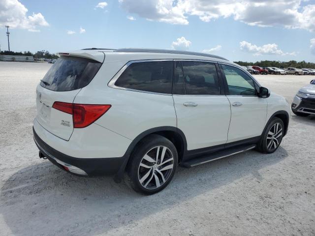 Photo 3 from auction – 2018 HONDA PILOT ELIT with VIN 5FNYF6H00JB019563