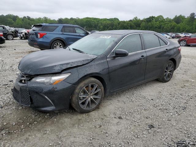 TOYOTA CAMRY LE 2017 with VIN 4T1BF1FKXHU796214 - Photo from auction
