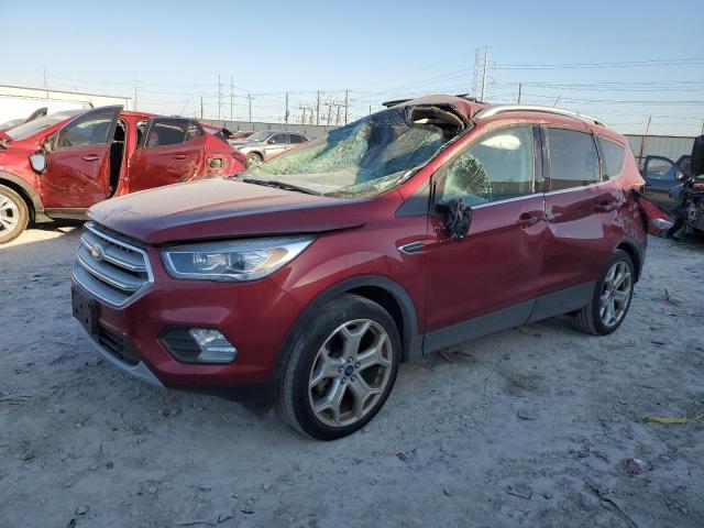 FORD ESCAPE TIT 2018 with VIN 1FMCU0J94JUC75679 - Photo from auction