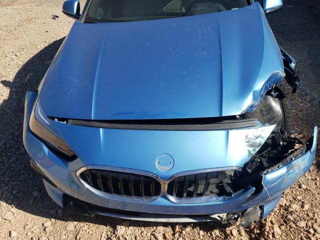 Photo 11 from auction – 2021 BMW 228XI with VIN WBA73AK04M7G43019