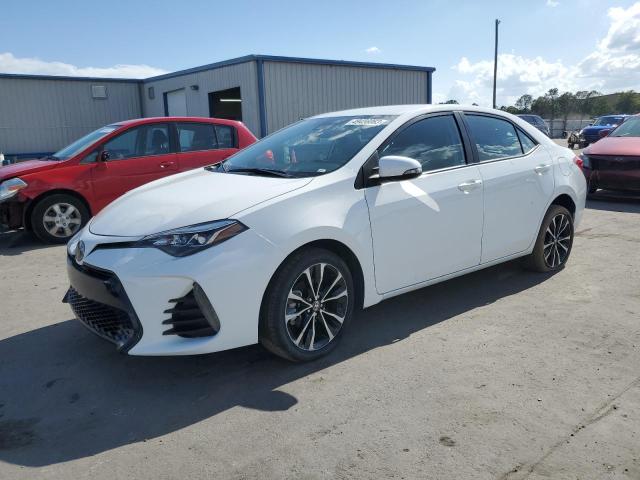 TOYOTA COROLLA L 2019 with VIN 5YFBURHE8KP925295 - Photo from auction