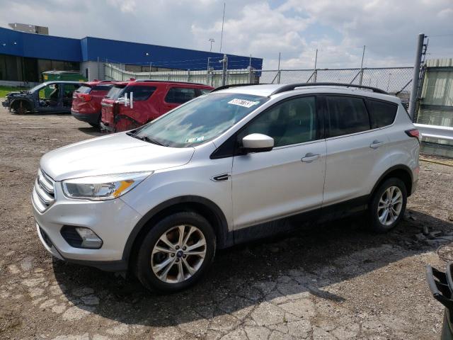 FORD ESCAPE SE 2018 with VIN 1FMCU9GDXJUB17380 - Photo from auction