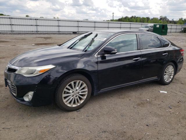TOYOTA AVALON HYB 2014 with VIN 4T1BD1EB6EU026059 - Photo from auction