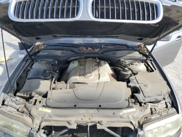 Photo 11 from auction – 2004 BMW 745 I with VIN WBAGL63404DP68659