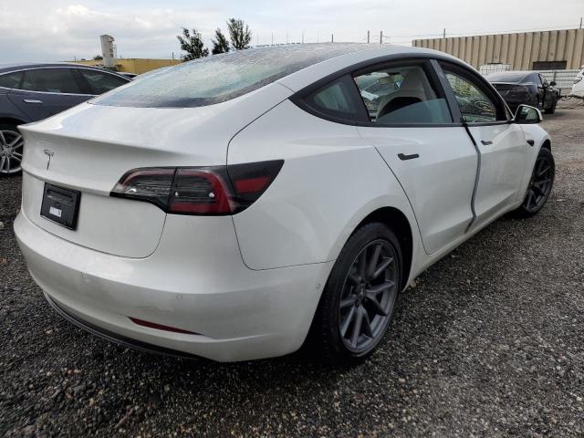Photo 3 from auction – 2021 TESLA MODEL 3 with VIN 5YJ3E1EA4MF047755