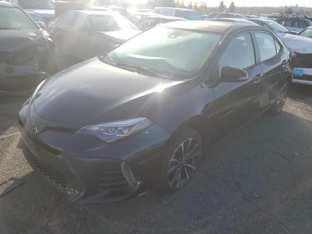 TOYOTA COROLLA L 2018 with VIN 2T1BURHE7JC028046 - Photo from auction