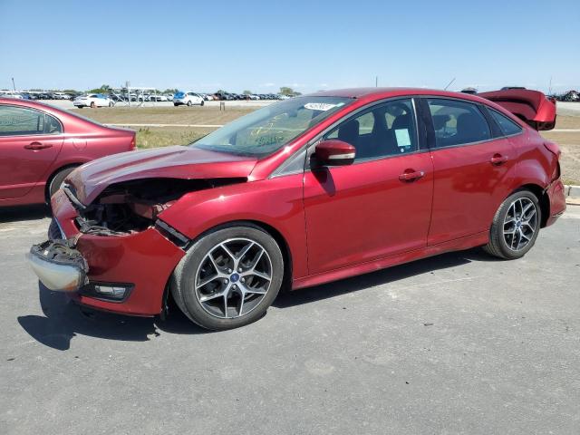FORD FOCUS SE 2015 with VIN 1FADP3F27FL386226 - Photo from auction