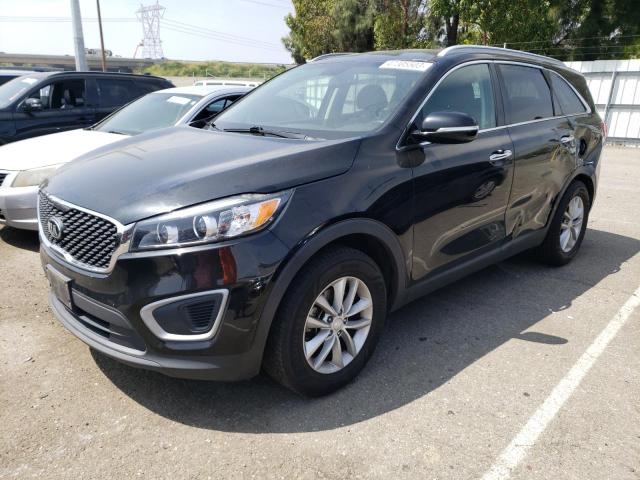 KIA SORENTO LX 2018 with VIN 5XYPG4A35JG340573 - Photo from auction