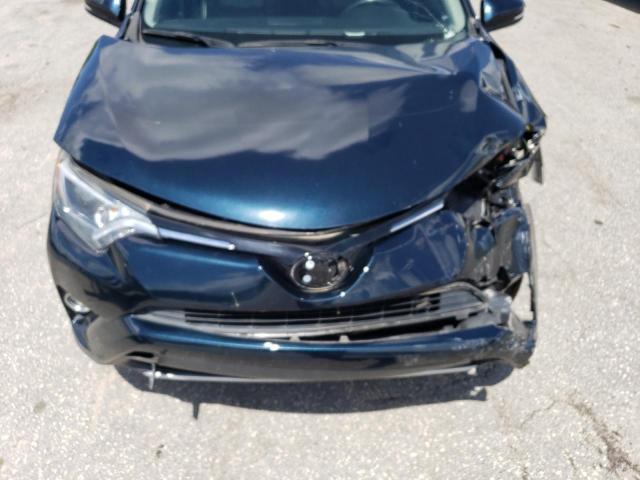 Photo 11 from auction – 2017 TOYOTA RAV4 XLE with VIN JTMRFREV4HD201046