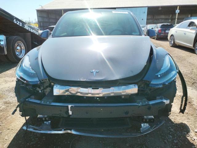 Photo 5 from auction – 2022 TESLA MODEL Y with VIN 7SAYGDEF7NF405559