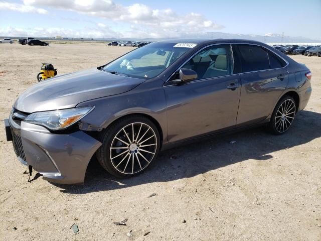 TOYOTA CAMRY LE 2017 with VIN 4T1BF1FK8HU375513 - Photo from auction