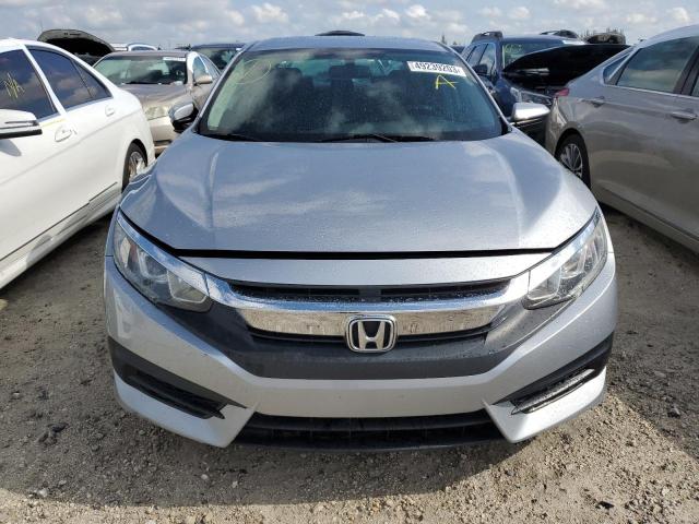 Photo 5 from auction – 2018 HONDA CIVIC LX with VIN 19XFC2F50JE036196