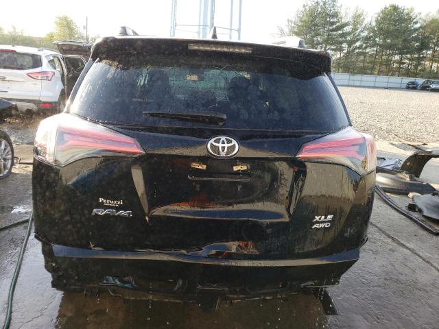 Photo 6 from auction – 2016 TOYOTA RAV4 XLE with VIN 2T3RFREV3GW515689