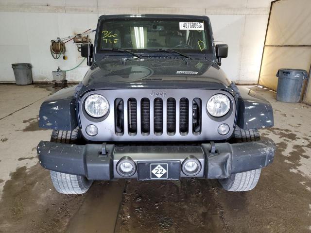 Photo 5 from auction – 2016 JEEP WRANGLER U with VIN 1C4BJWDG8GL193670