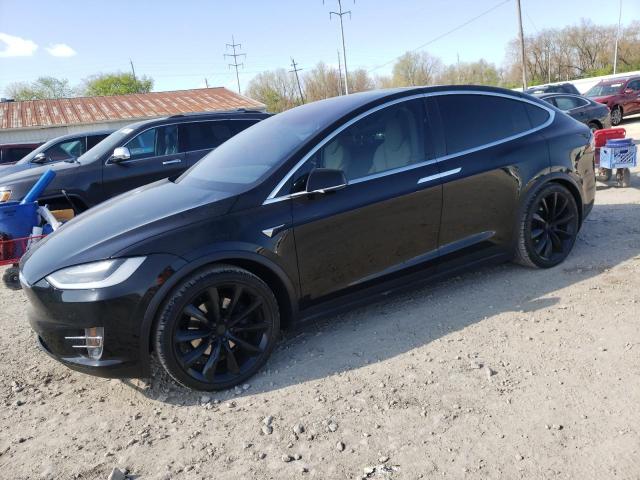 TESLA MODEL X 2018 with VIN 5YJXCAE23JF141296 - Photo from auction
