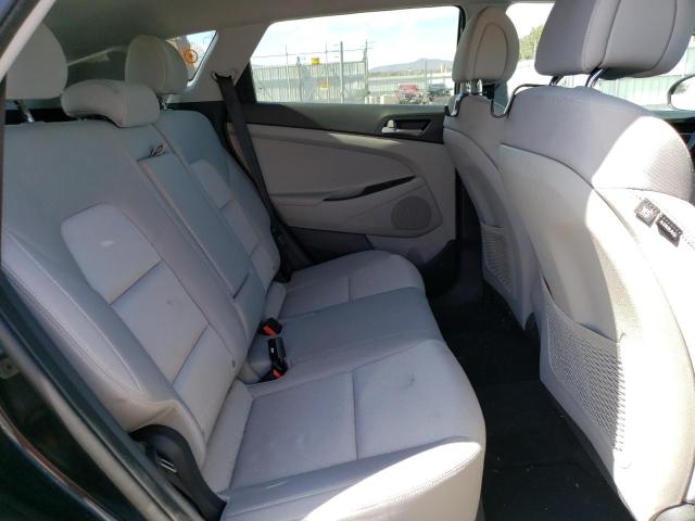 Photo 11 from auction – 2018 HYUNDAI TUCSON SE with VIN KM8J2CA42JU778632