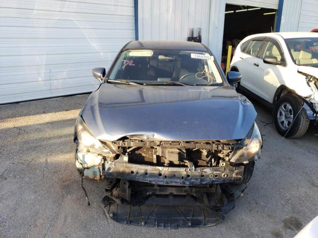 Photo 5 from auction – 2014 MAZDA 3 TOURING with VIN JM1BM1V78E1123457