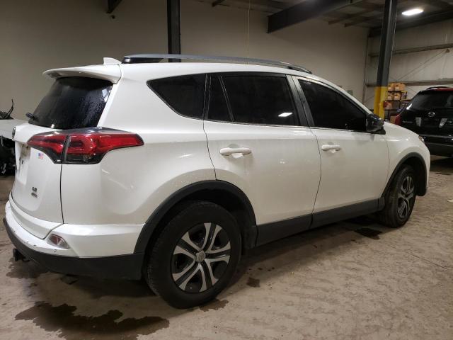 Photo 3 from auction – 2018 TOYOTA RAV4 LE with VIN JTMBFREV0JJ218385