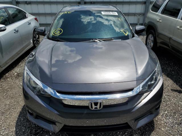 Photo 5 from auction – 2018 HONDA CIVIC EX with VIN JHMFC1F34JX006237