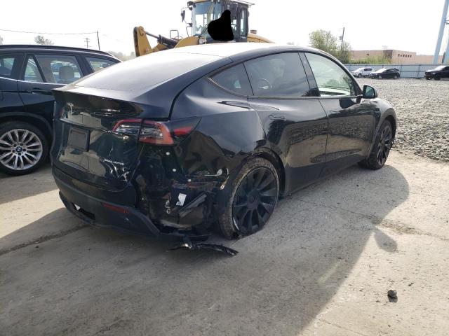 Photo 3 from auction – 2022 TESLA MODEL Y with VIN 7SAYGAEE7NF401632