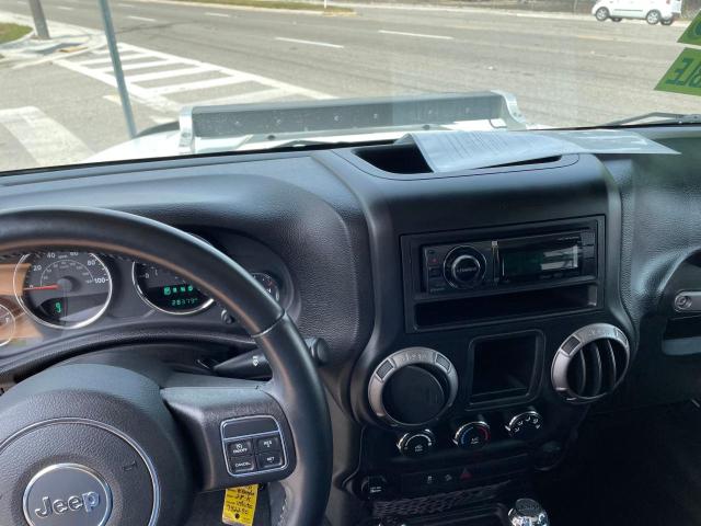 Photo 9 from auction – 2015 JEEP WRANGLER S with VIN 1C4AJWAG7FL742290