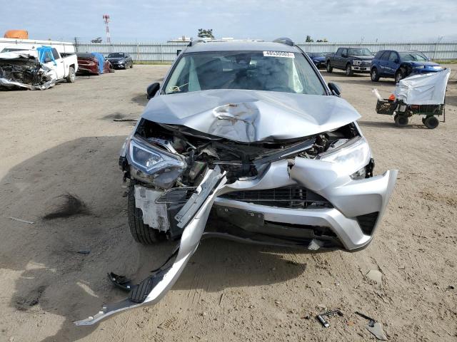 Photo 5 from auction – 2018 TOYOTA RAV4 LE with VIN JTMZFREV6JJ164556