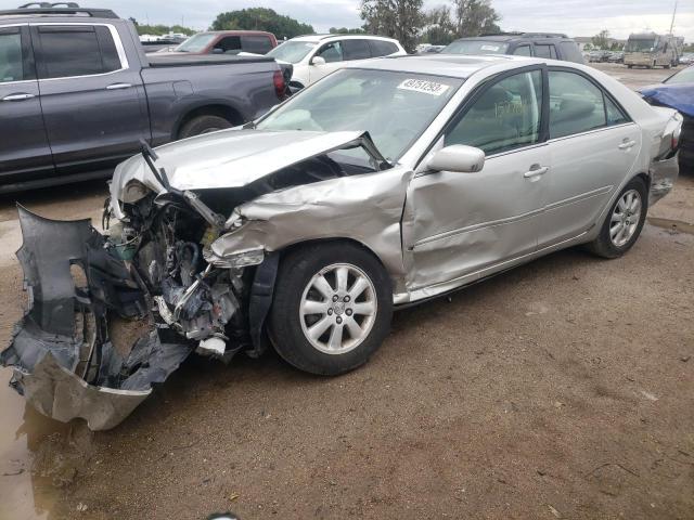 TOYOTA CAMRY LE 2003 with VIN 4T1BE32K53U672199 - Photo from auction