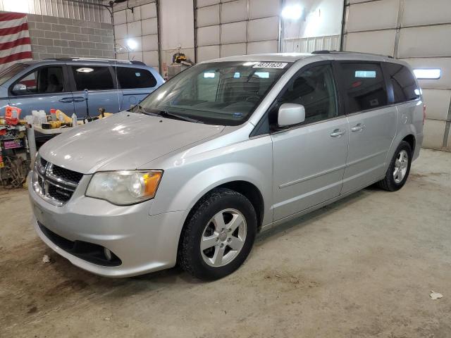 DODGE CARAVAN 2011 with VIN 2D4RN5DG8BR660053 - Photo from auction