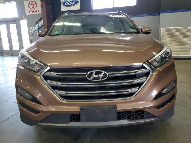 Photo 5 from auction – 2016 HYUNDAI TUCSON LIM with VIN KM8J3CA28GU117577
