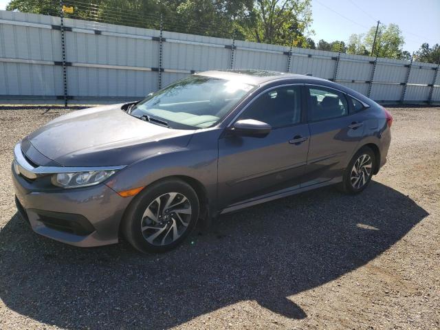 HONDA CIVIC EX 2018 with VIN 19XFC2F70JE008822 - Photo from auction