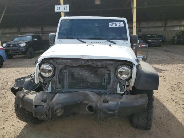 Photo 5 from auction – 2016 JEEP WRANGLER S with VIN 1C4AJWAG2GL122951
