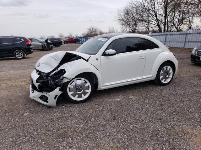 VOLKSWAGEN BEETLE SE 2019 with VIN 3VWJD7AT8KM714904 - Photo from auction