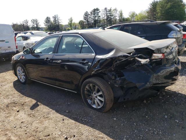 Photo 2 from auction – 2012 TOYOTA CAMRY HYBR with VIN 4T1BD1FK0CU016090
