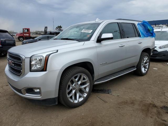 GMC YUKON SLE 2019 with VIN 1GKS2AKC8KR329483 - Photo from auction