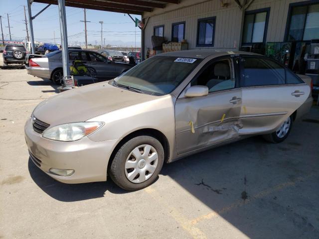 TOYOTA CAMRY LE 2002 with VIN JTDBE32K020045209 - Photo from auction