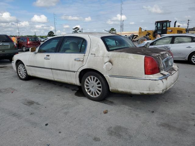 Photo 2 from auction – 2003 LINCOLN TOWN CAR E with VIN 1LNHM81W93Y631906