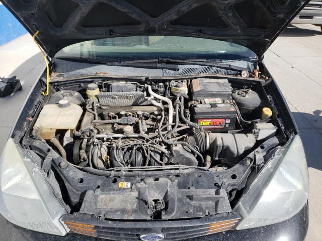 Photo 11 from auction – 2004 FORD FOCUS with VIN 1FAHP38ZX4W177022
