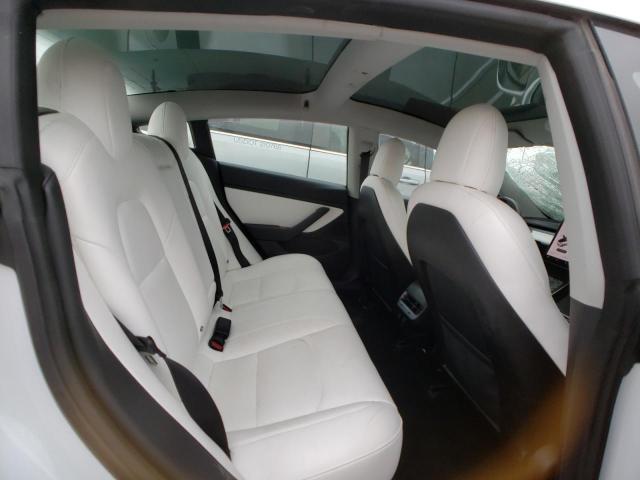 Photo 11 from auction – 2018 TESLA MODEL 3 with VIN 5YJ3E1EB2JF081892