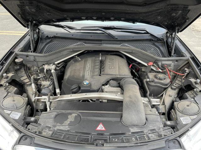 Photo 7 from auction – 2015 BMW X5 XDRIVE3 with VIN 5UXKR0C5XF0P03554