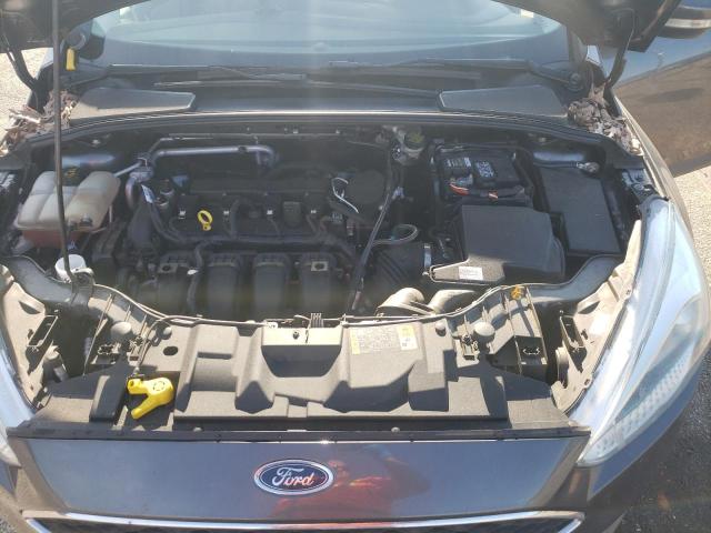 Photo 11 from auction – 2015 FORD FOCUS SE with VIN 1FADP3F28FL252518