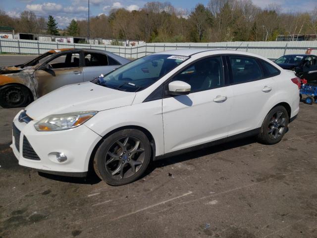 FORD FOCUS SE 2013 with VIN 1FADP3F25DL212328 - Photo from auction