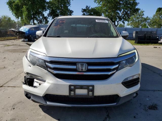 Photo 5 from auction – 2017 HONDA PILOT TOUR with VIN 5FNYF5H99HB024974
