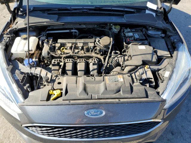 Photo 11 from auction – 2015 FORD FOCUS S with VIN 1FADP3E2XFL312249