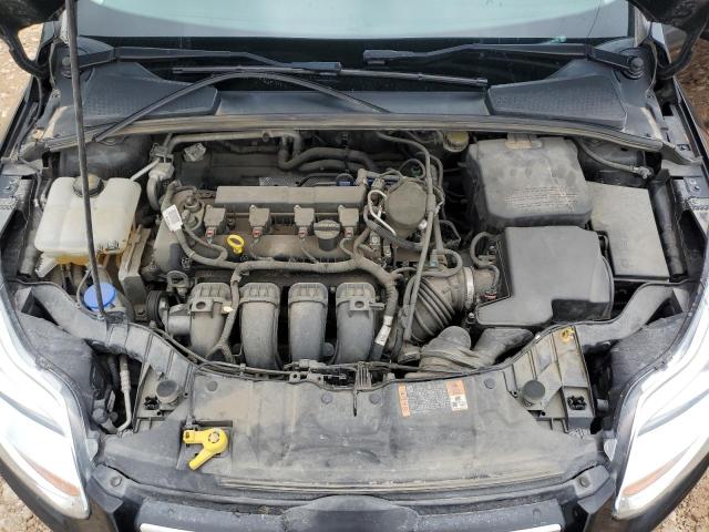 Foto 11 de la subasta – 2014 FORD FOCUS SE con VIN 1FADP3K23EL362140