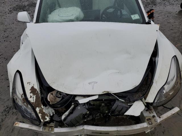 Photo 11 from auction – 2018 TESLA MODEL 3 with VIN 5YJ3E1EB4JF086303