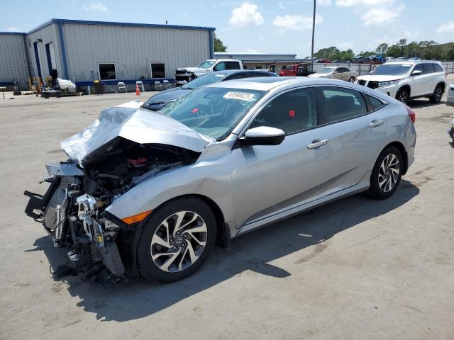 HONDA CIVIC EX 2018 with VIN 19XFC2F73JE041832 - Photo from auction