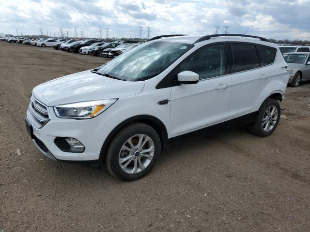 FORD ESCAPE SE 2018 with VIN 1FMCU9GD8JUC55984 - Photo from auction